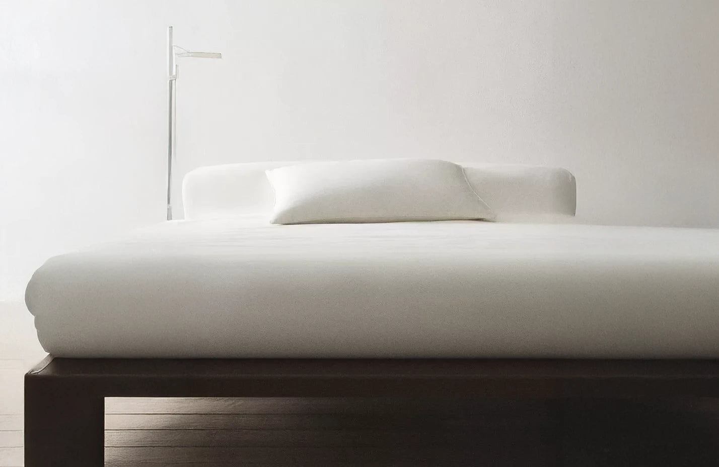 Luxurious satin square pillowcase in frost white, soft to the touch and beautifully refined.