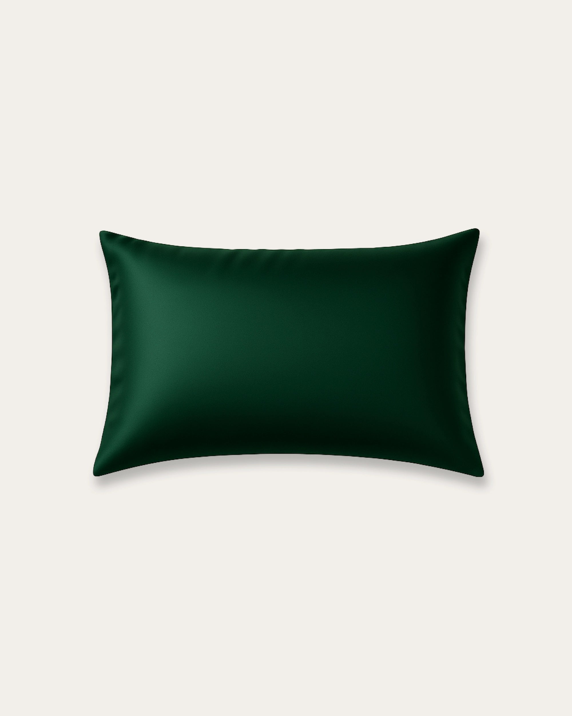 Pine green satin pillowcase combining silky softness, luxurious comfort, and elegant style to enhance restful sleep and elevate bedroom décor.