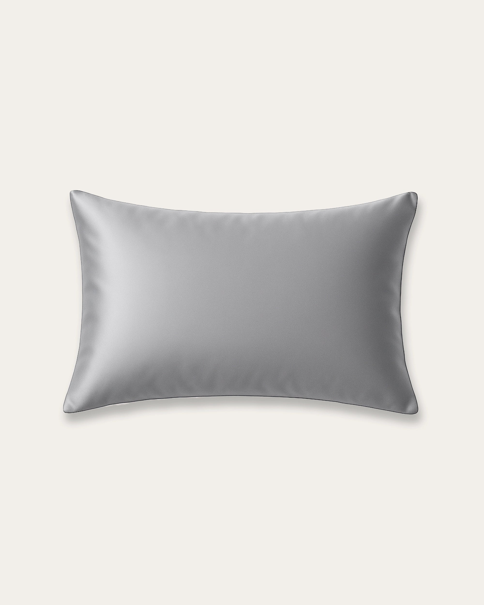 Moonlight silver satin pillowcase with a sleek metallic sheen, perfect for modern interiors and hair protection.