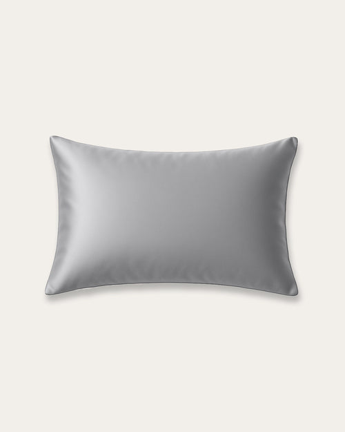 Moonlight silver satin pillowcase with a sleek metallic sheen, perfect for modern interiors and hair protection.