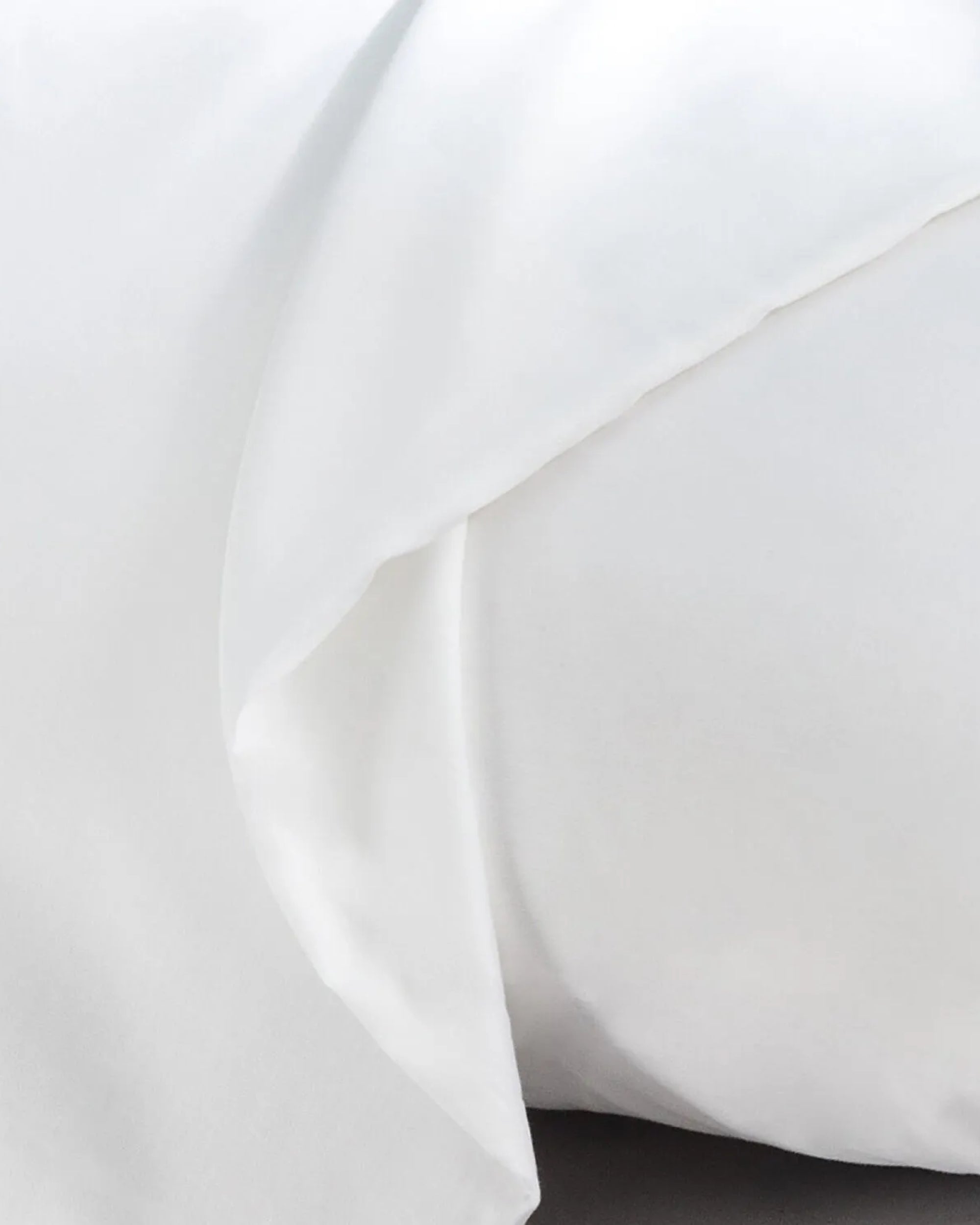 Frost white satin pillowcase showcasing a smooth, silky surface for comfortable sleep and hair care.