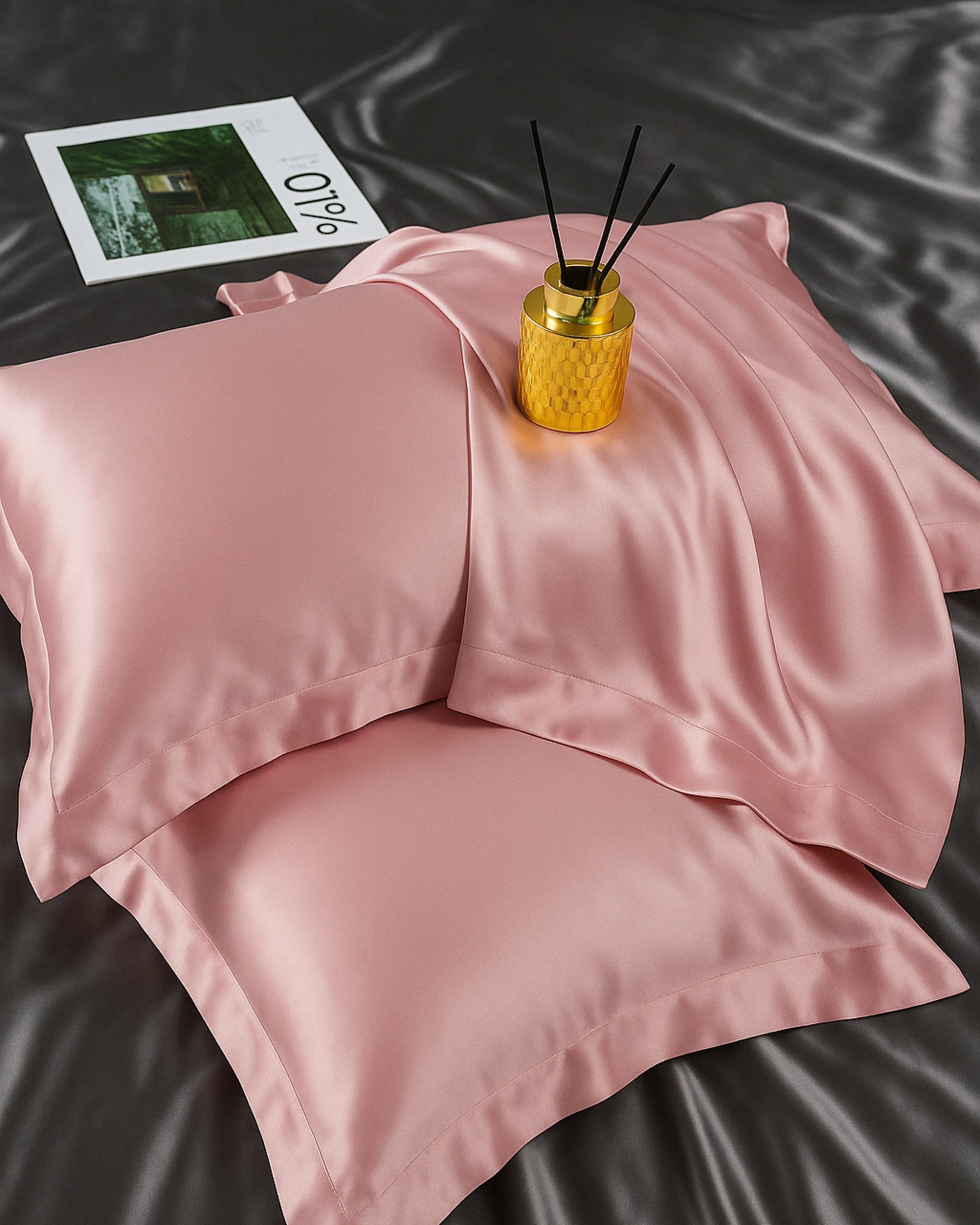 Luxurious blossom pink satin Oxford pillowcase bringing silky softness, comfort, and a chic accent to your bedding collection.