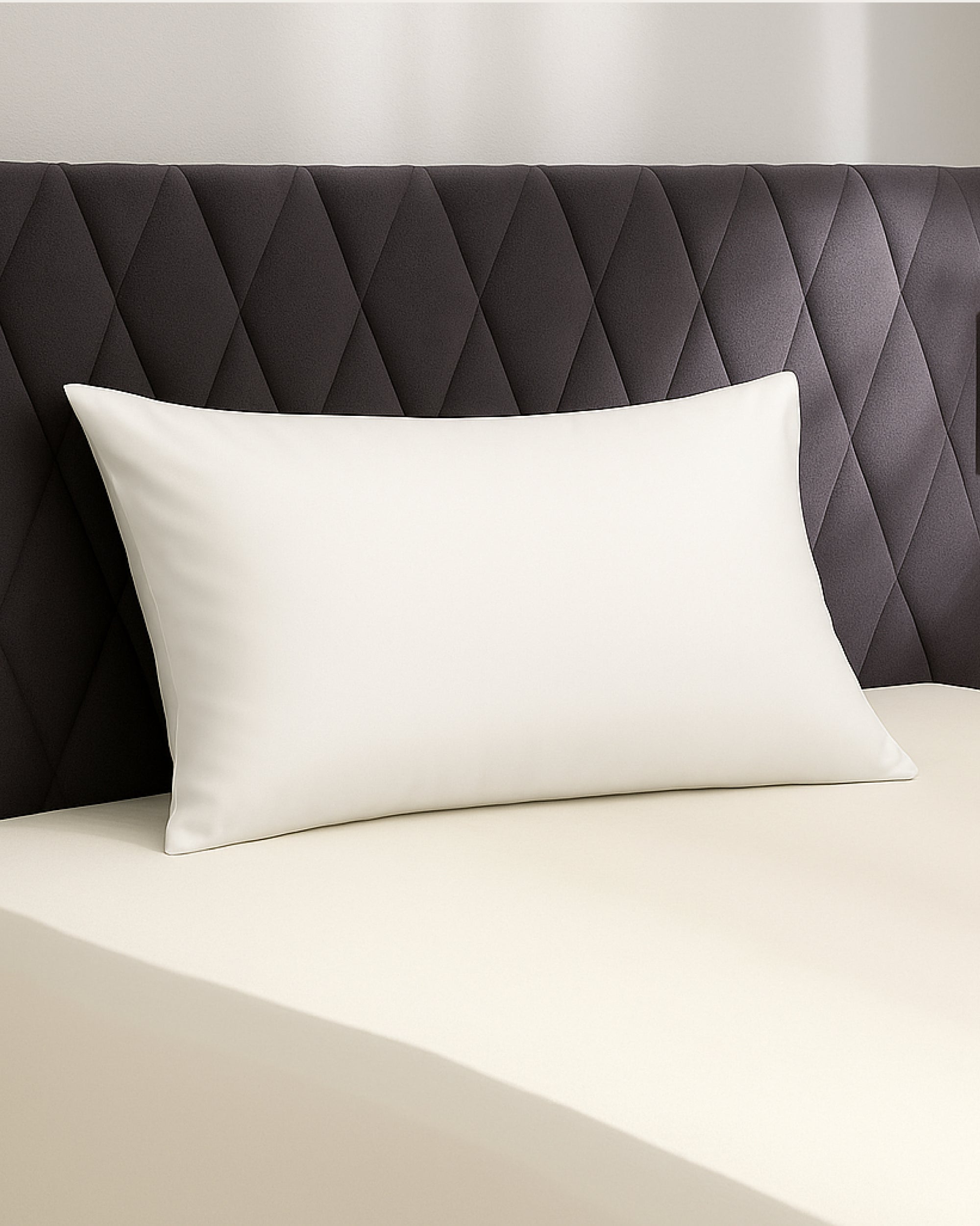 Frost white satin pillowcase on a stylish bed, offering elegance and comfort for better sleep and skin care.