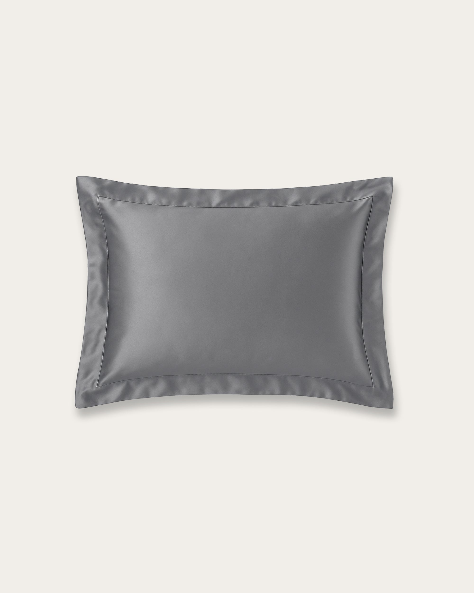 Moonlight Silver Satin Oxford Pillowcase featuring a sleek metallic sheen and elegant tailored border.