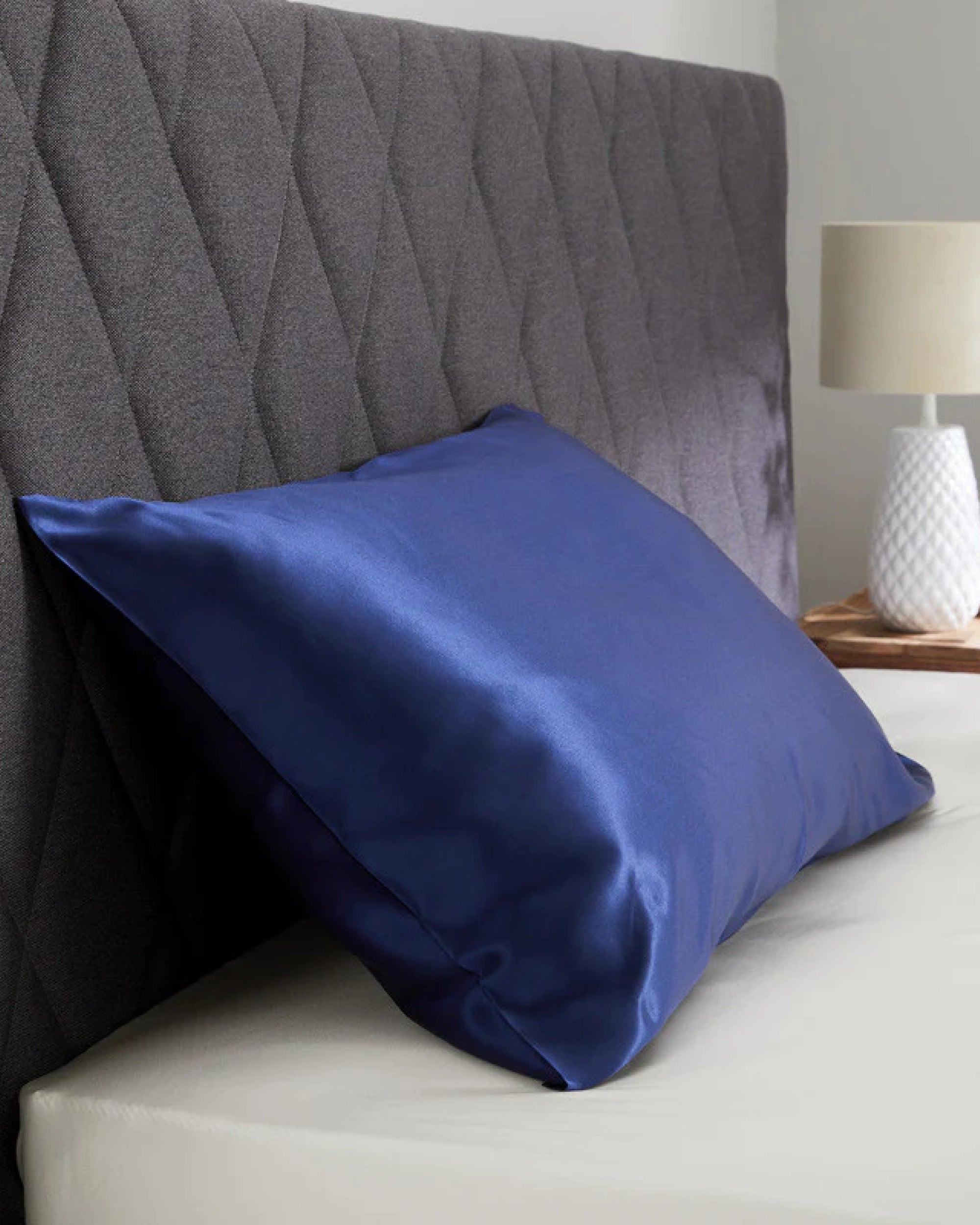 Elegant Midnight Blue satin pillowcase designed for a chic and cozy bedroom look.
