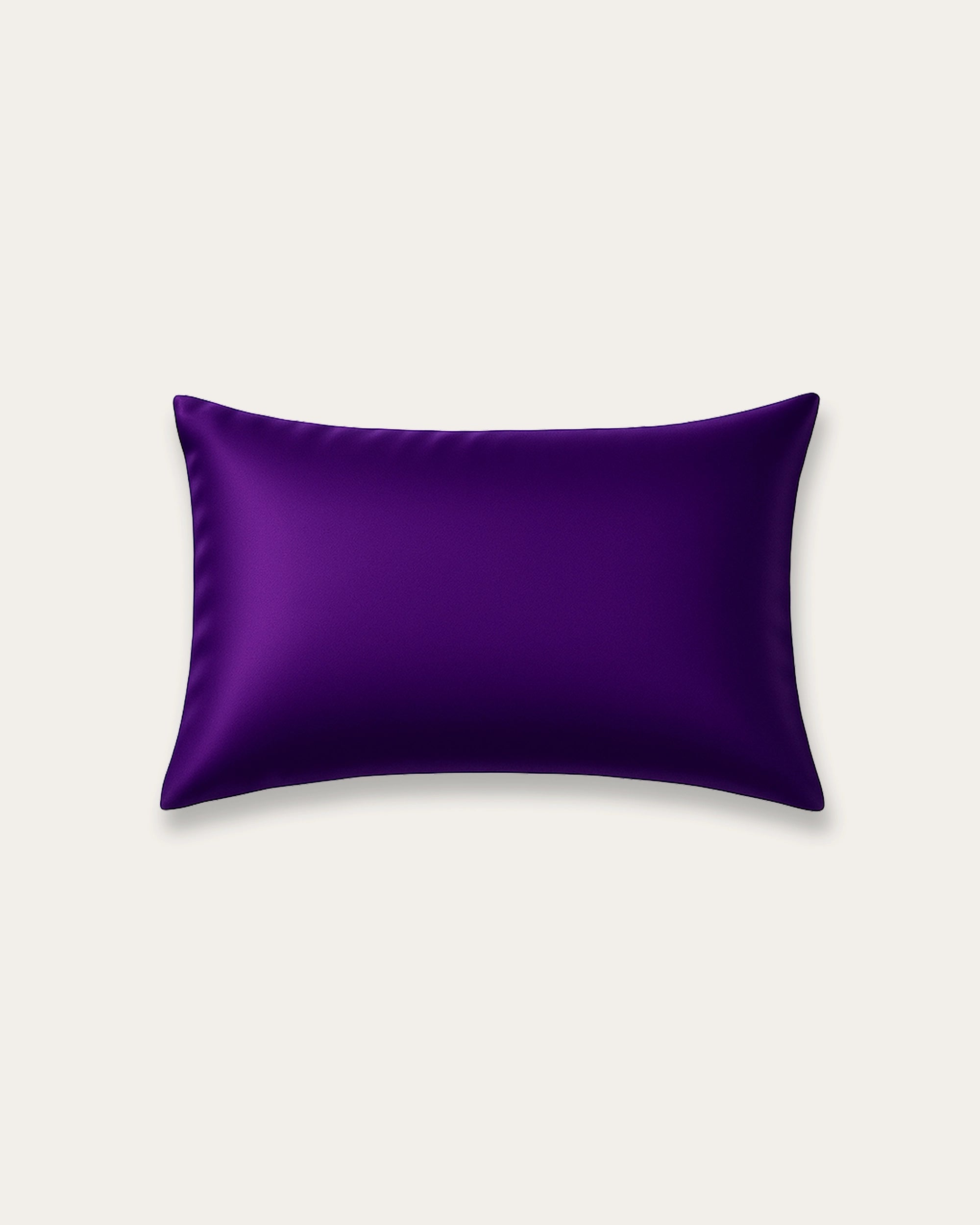 Deep purple satin pillowcase offering a silky smooth texture, luxurious comfort, and elegant style for restful sleep and refined bedroom décor.