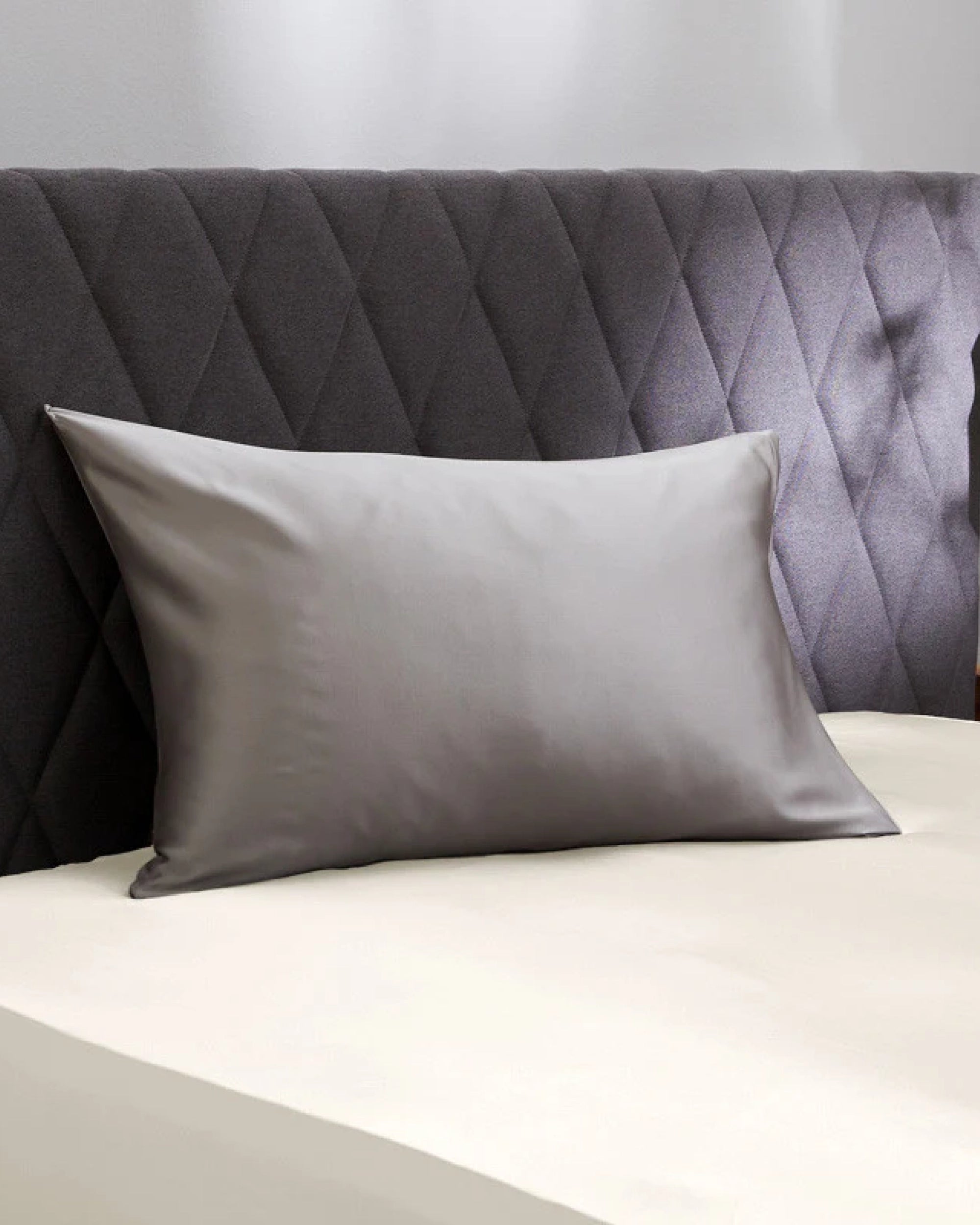 Close-up of Moonlight Silver Pillowcase showcasing its silky texture and romantic charm for a fresh morning look.