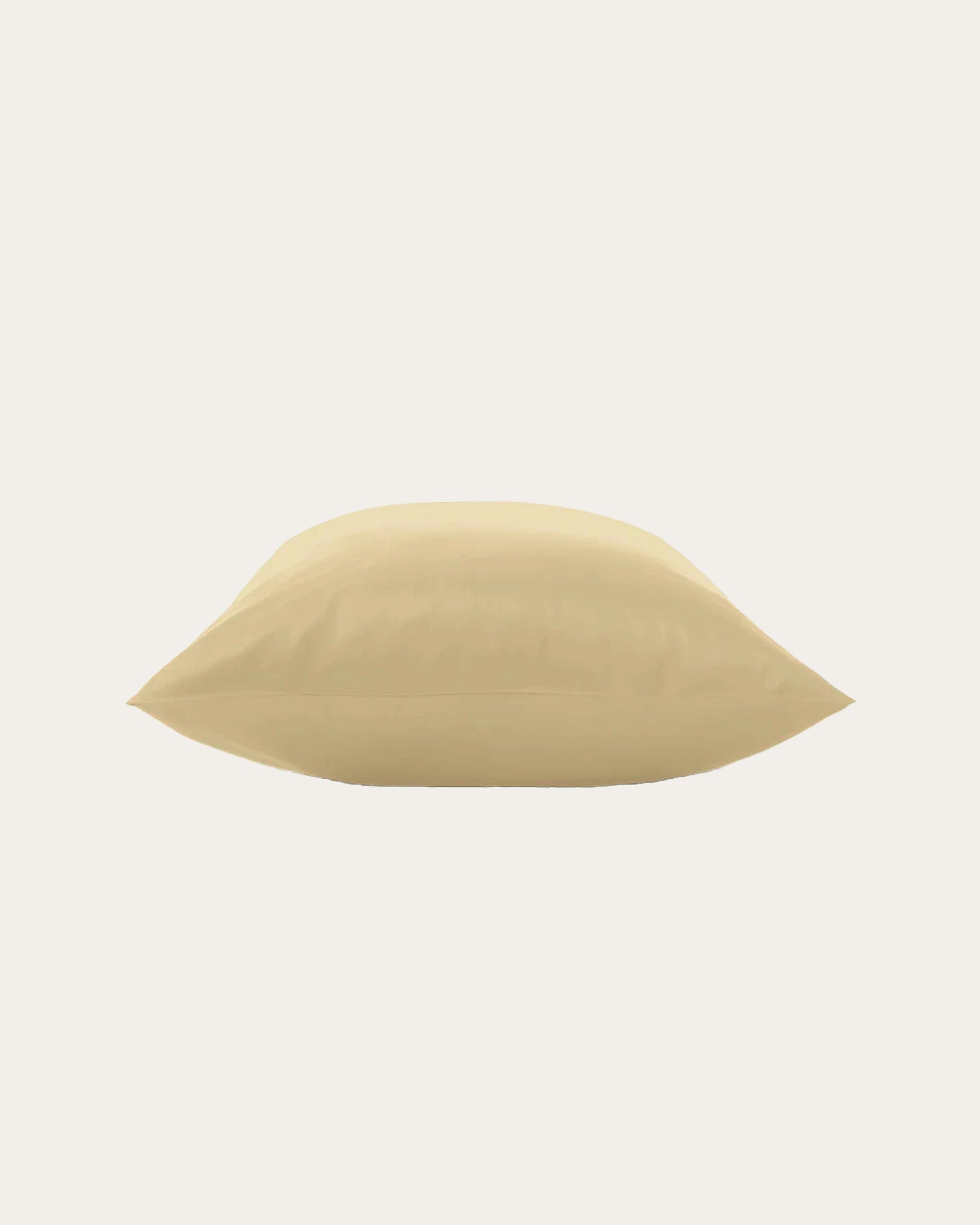 Beige satin square pillowcase on a neutral background, designed for soft skin and sleek hair.
