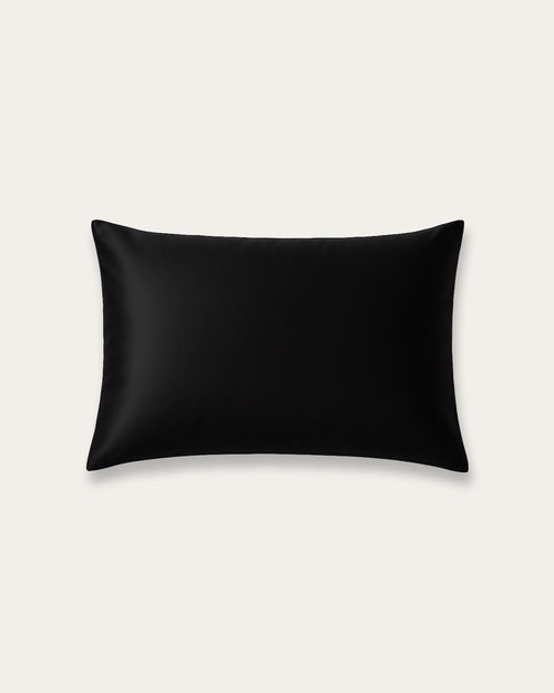 Sleek black velour satin pillowcase, perfect for enhancing elegance and preventing hair breakage.