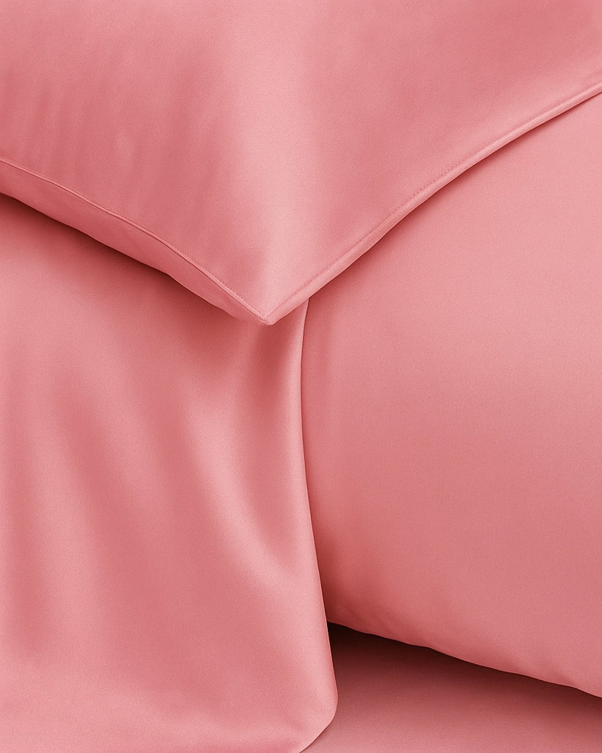 Close-up of Blossom Pink Satin Pillowcase showcasing its silky texture and romantic charm for a fresh morning look.
